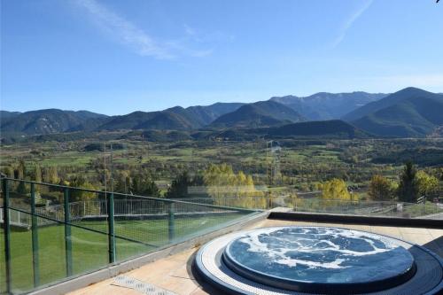 A jacuzzi with a view at the Cerdayna EcoResort